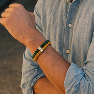 Green Tiger Eye armband gestapeld met Yellow Grass Jasper om de pols