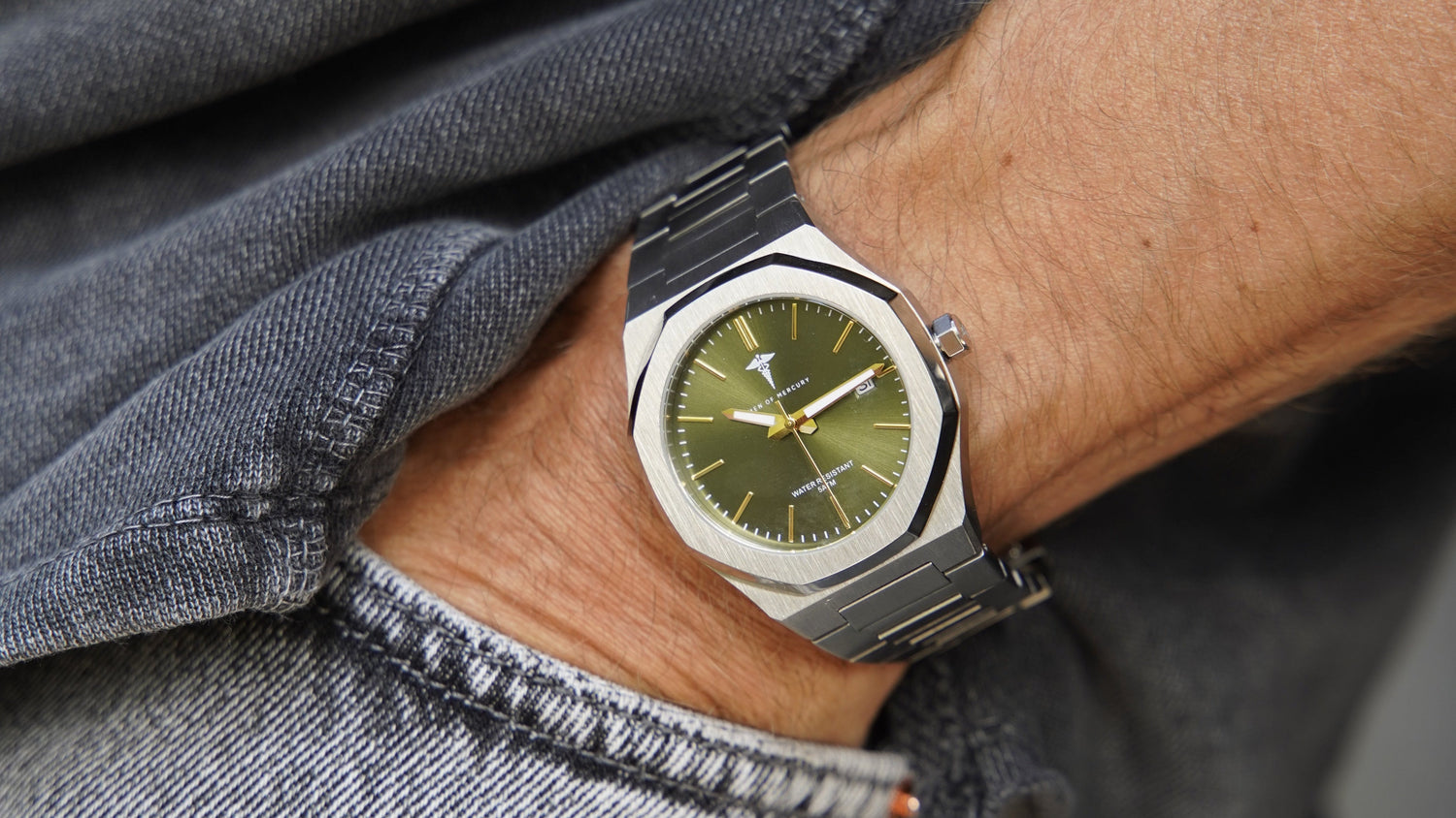 Momentum Green luxury watch dial macro detail